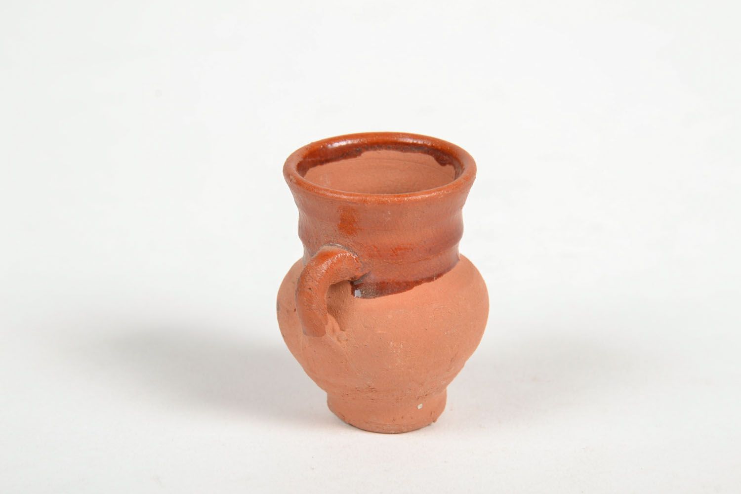 Statuetta brocca in argilla fatta a mano figurina decorativa in ceramica 
 foto 4