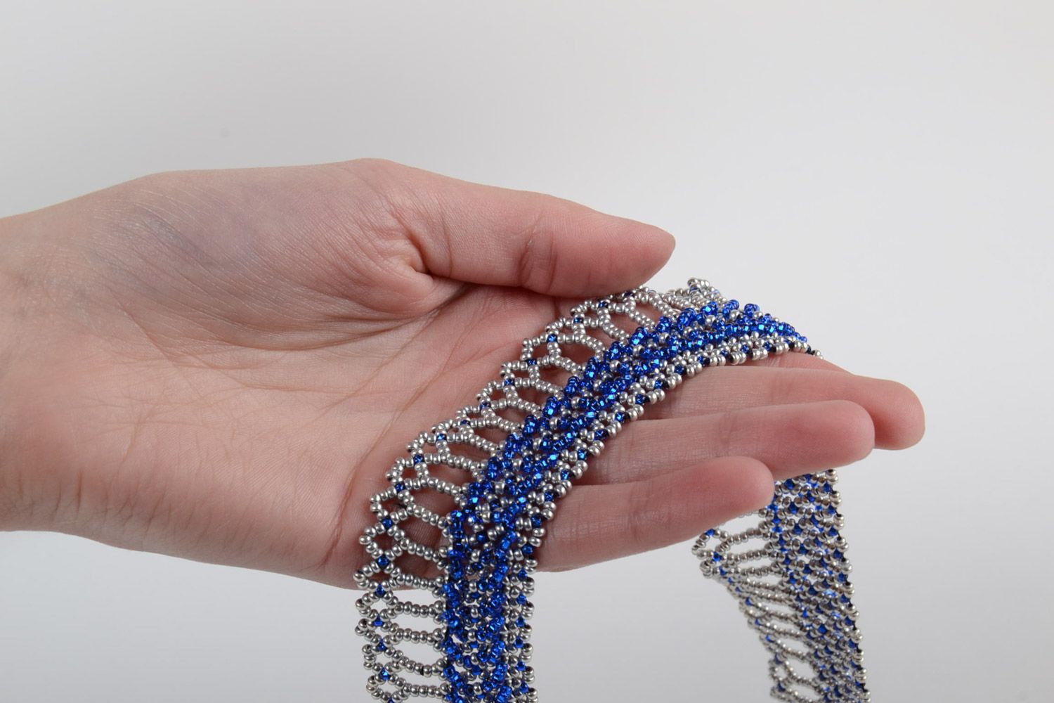 Beautiful lacy handmade women's beaded necklace of blue and white colors photo 5