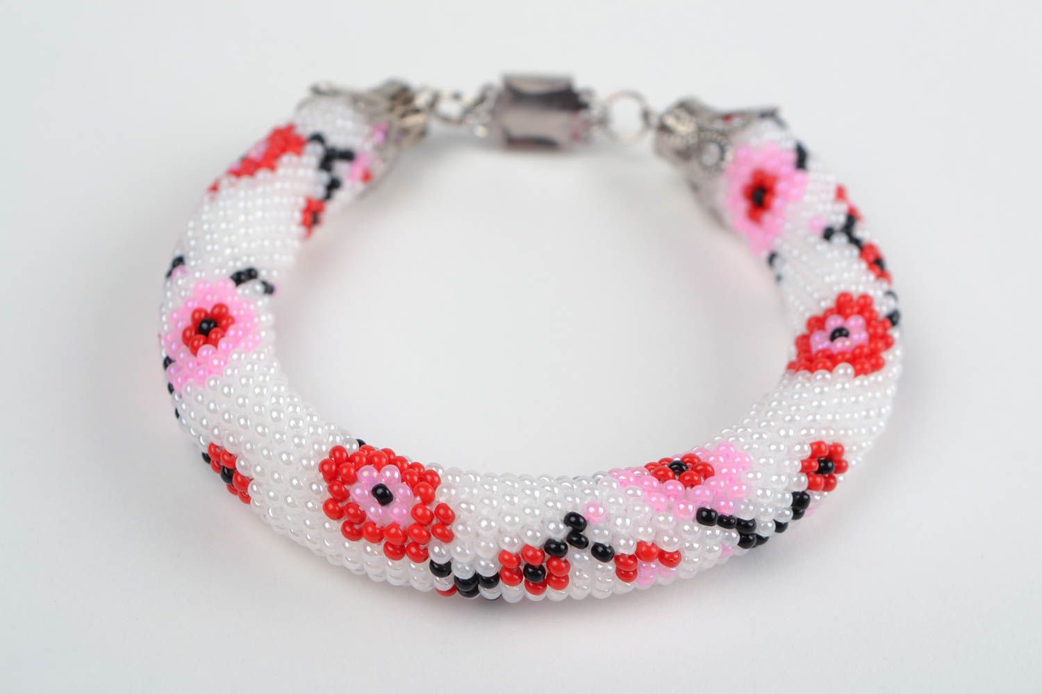 Beaded corded handmade female white bracelet with flowers photo 4
