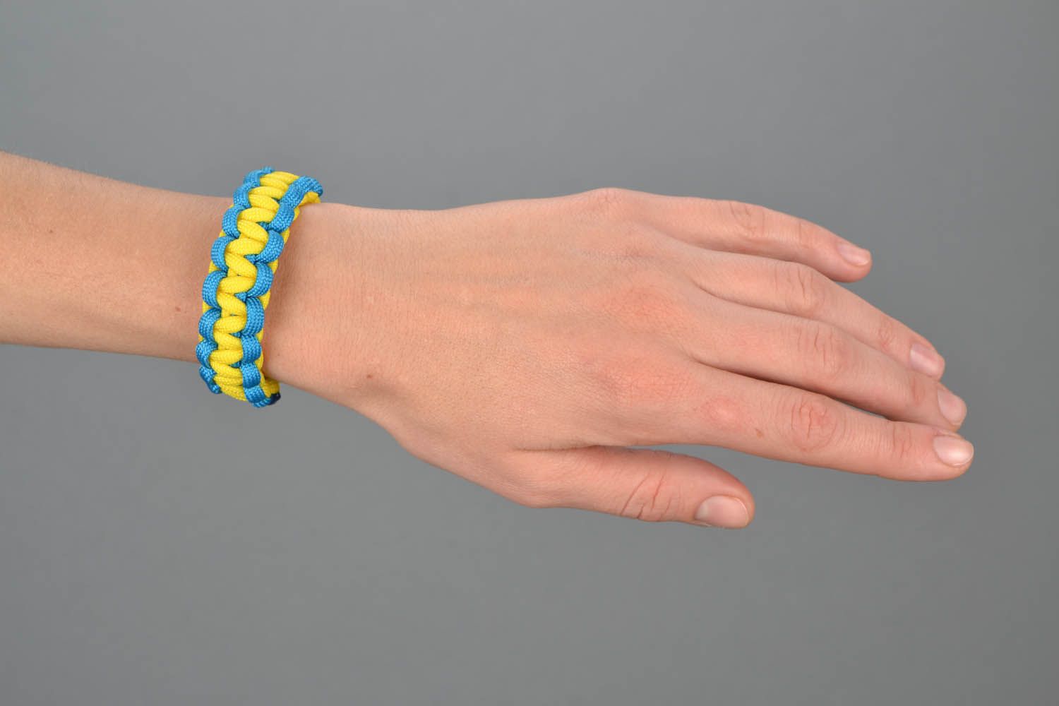 Bracelet en paracorde jaune et bleu fait main photo 1