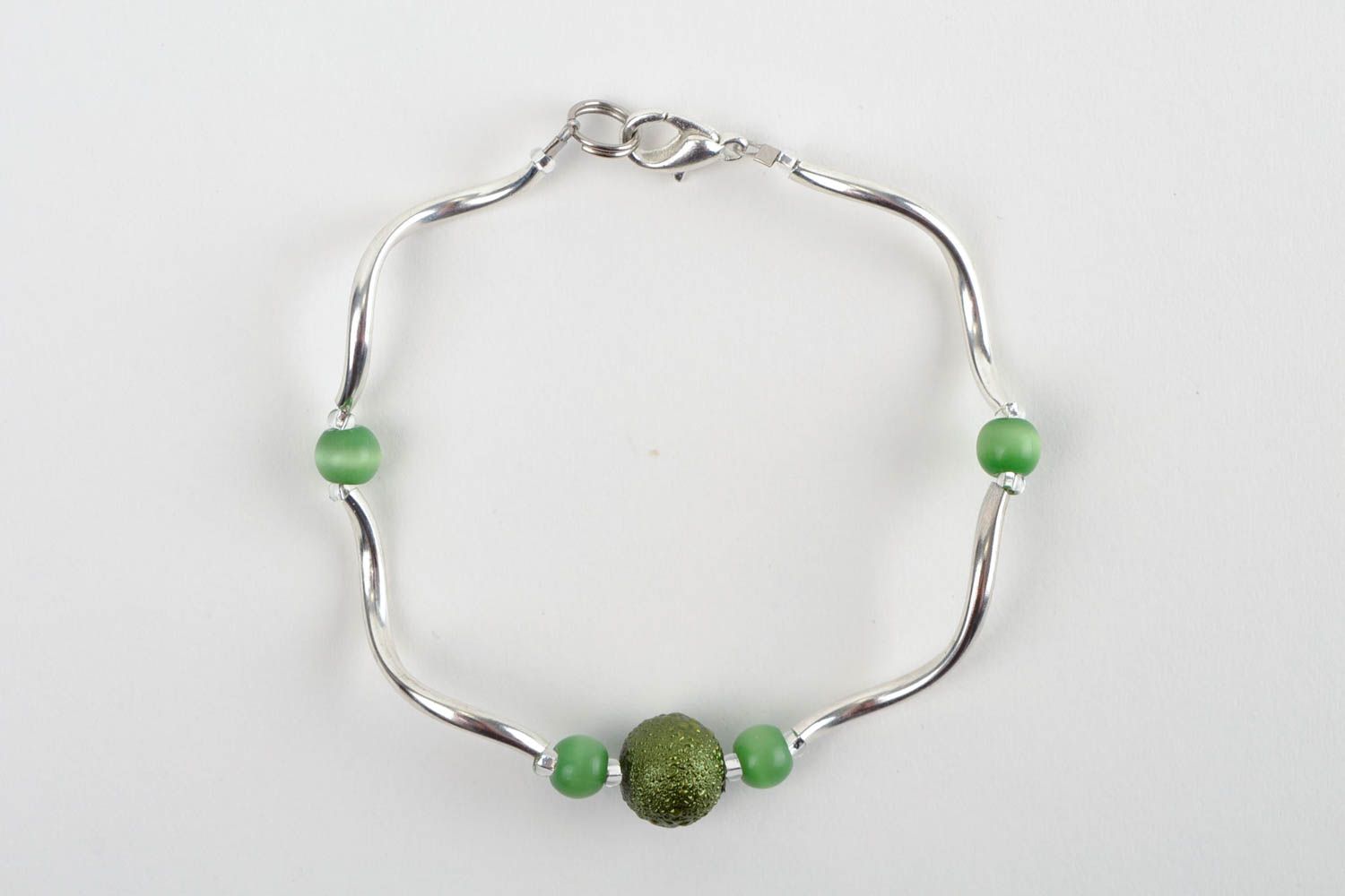 Unique elegant metal bracelet with green beads for a young girl photo 4
