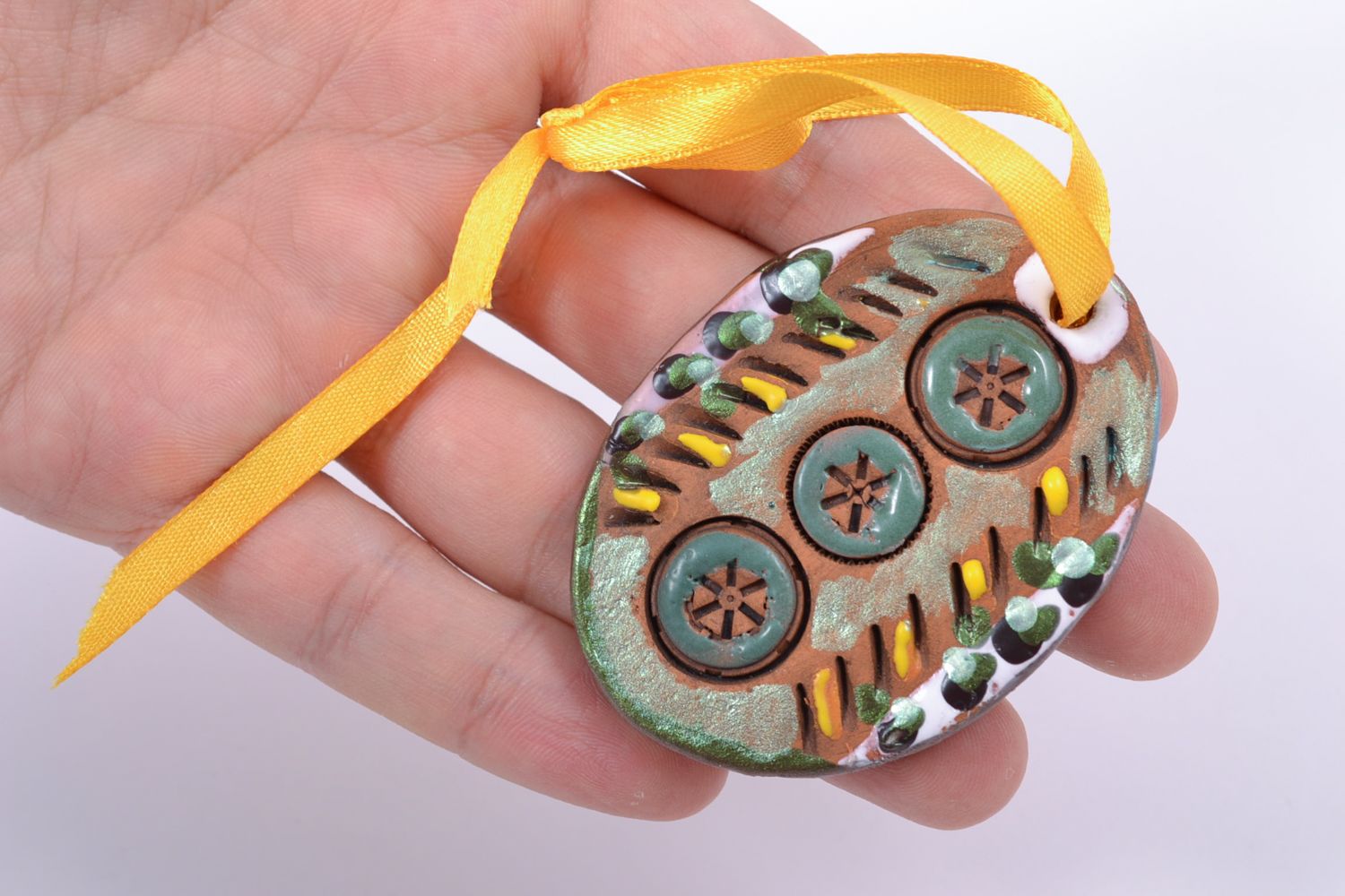 Porte-clefs en terre cuite ovale à motif peint de couleurs acryliques fait main photo 2
