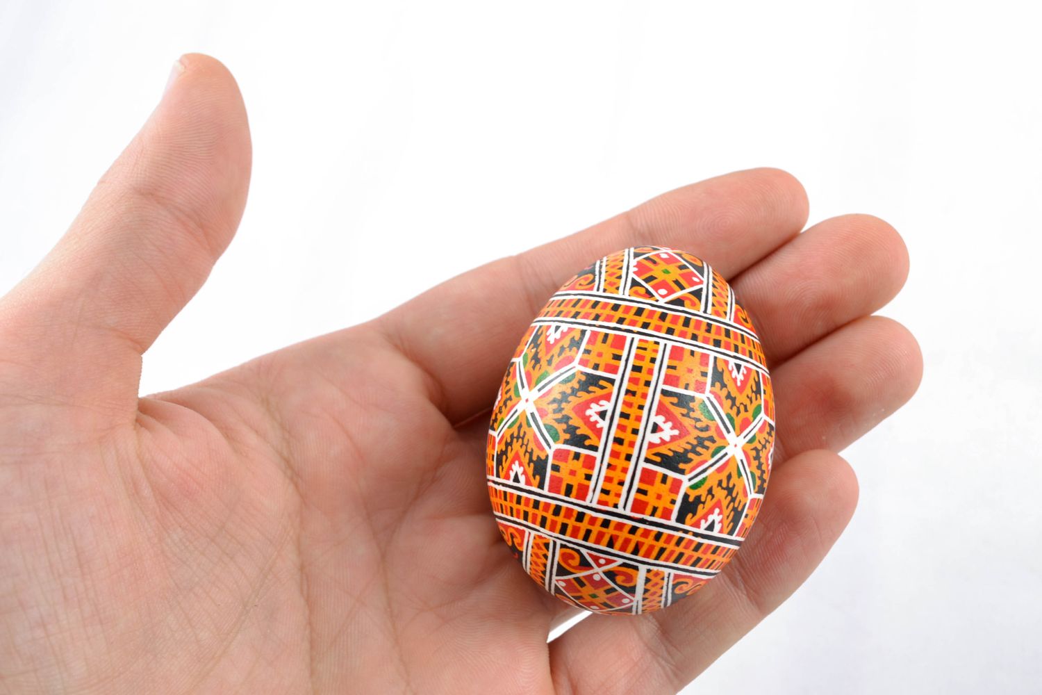 Painted Easter egg with rich pattern photo 2