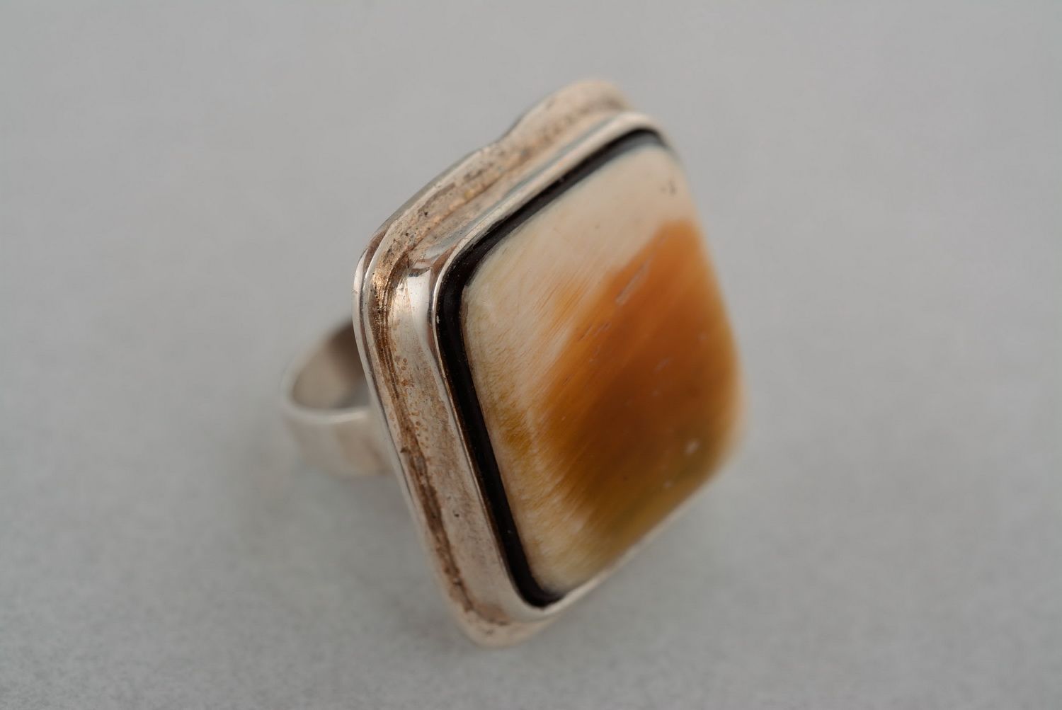 Ring with a cow horn photo 4