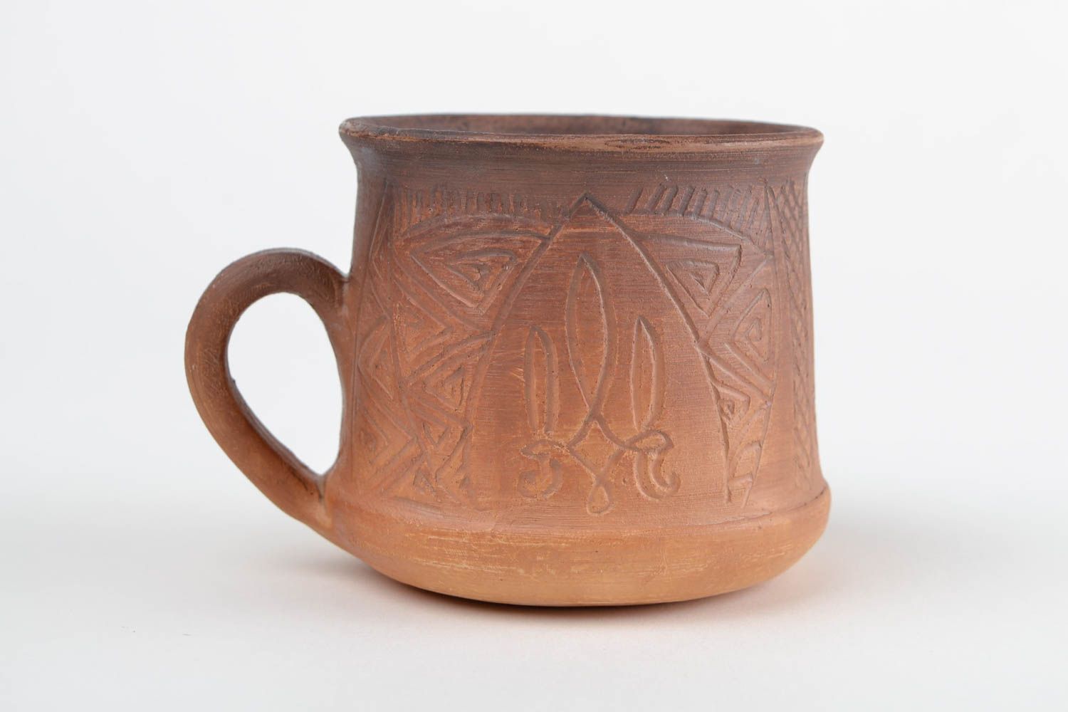Non-glazed clay cup for tea or coffee with handle and Ukrainian country symbol photo 3