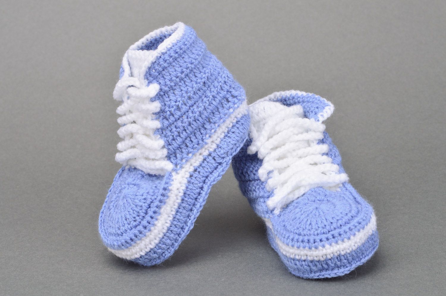 Handmade small crocheted blue baby sneakers with white shoelaces  photo 2