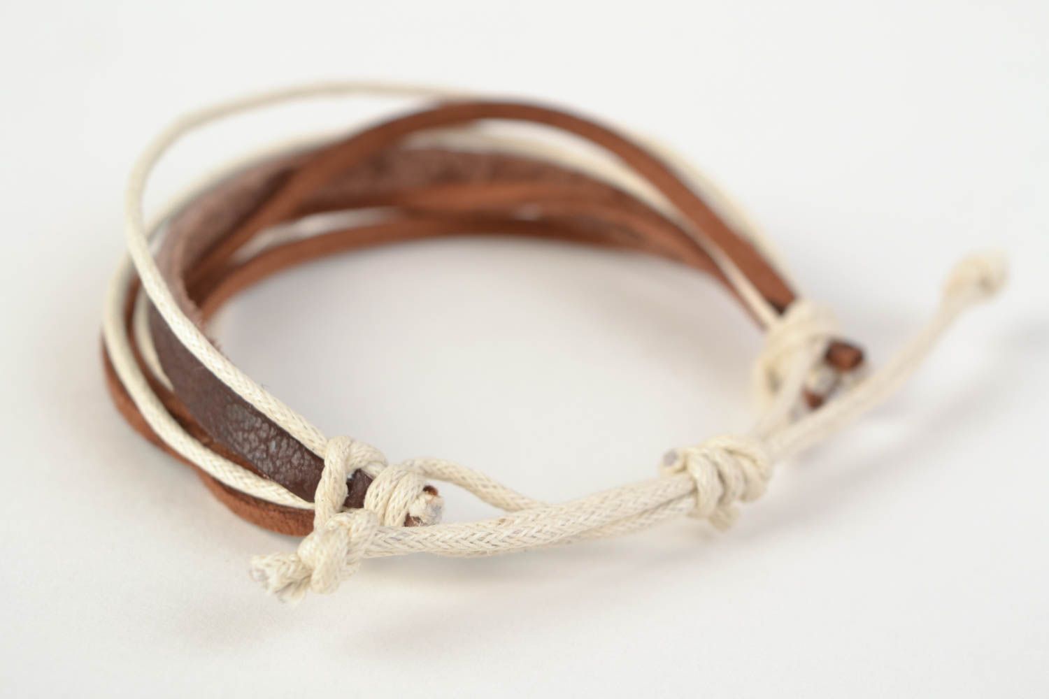 Handmade genuine leather and suede cords wrist bracelet in brown color palette photo 4