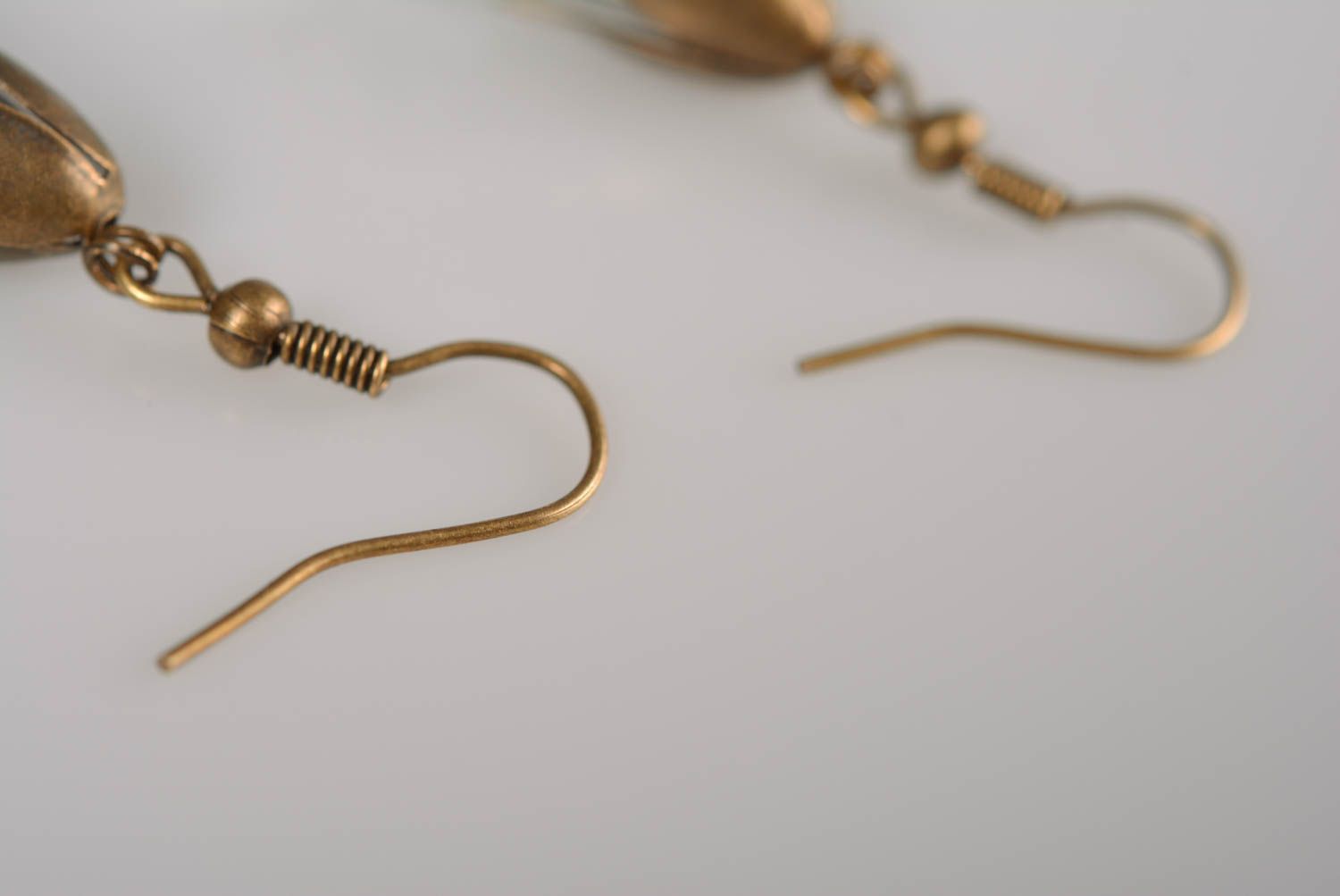 Handmade metal dangle earrings with transparent drop shaped plastic beads photo 5