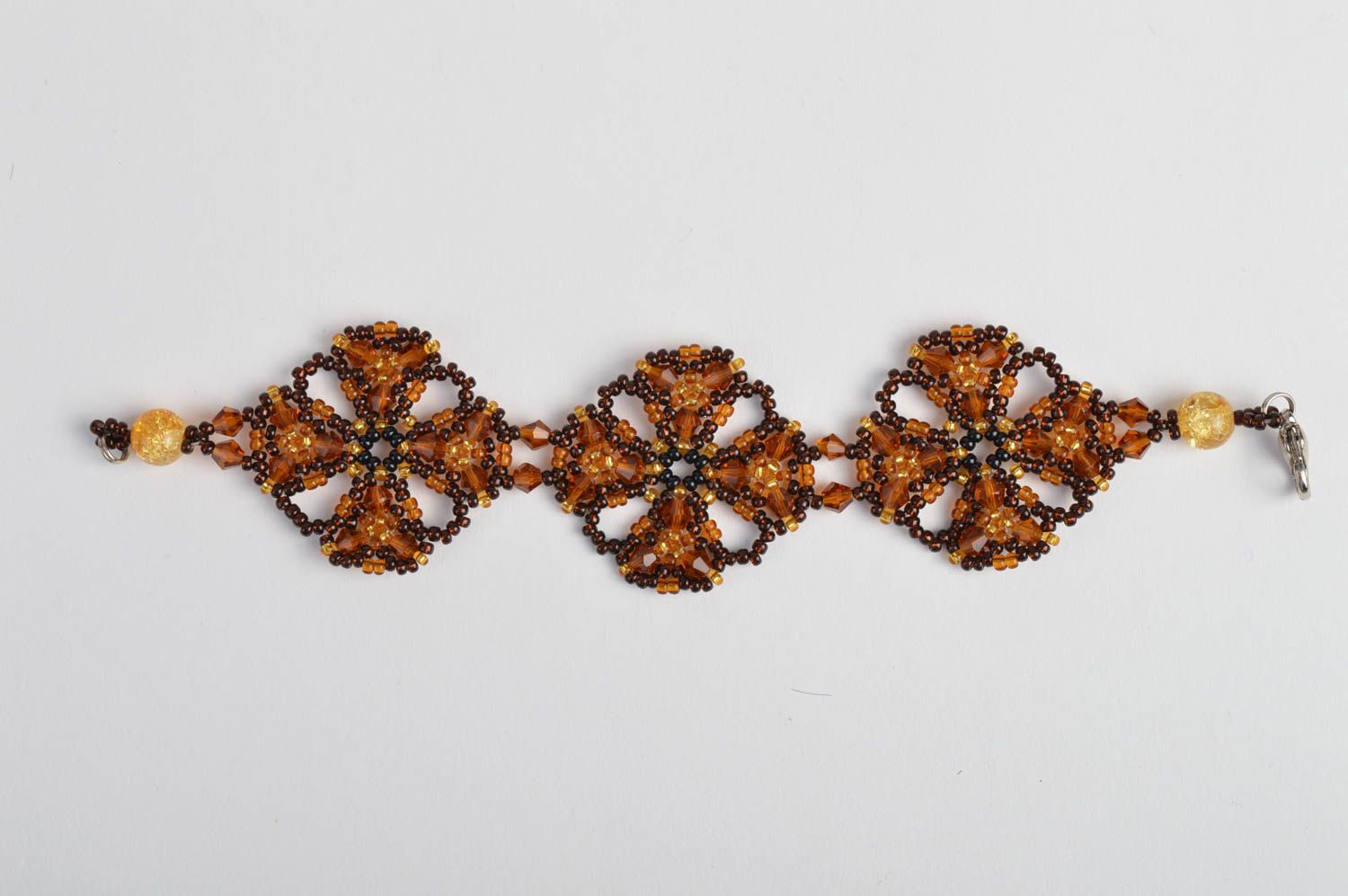 Авторский плетеный браслет из бисера и бусин ручной работы коричневый с желтым  фото 2