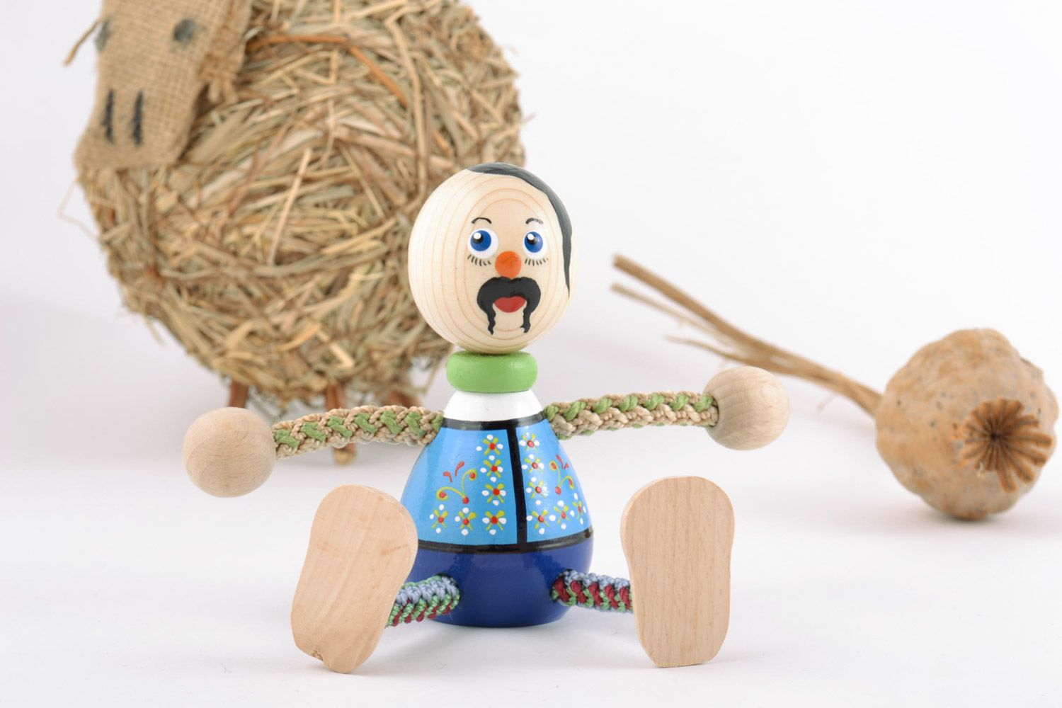 Juguete de madera artesanal con forma de cosaco original para niños foto 1