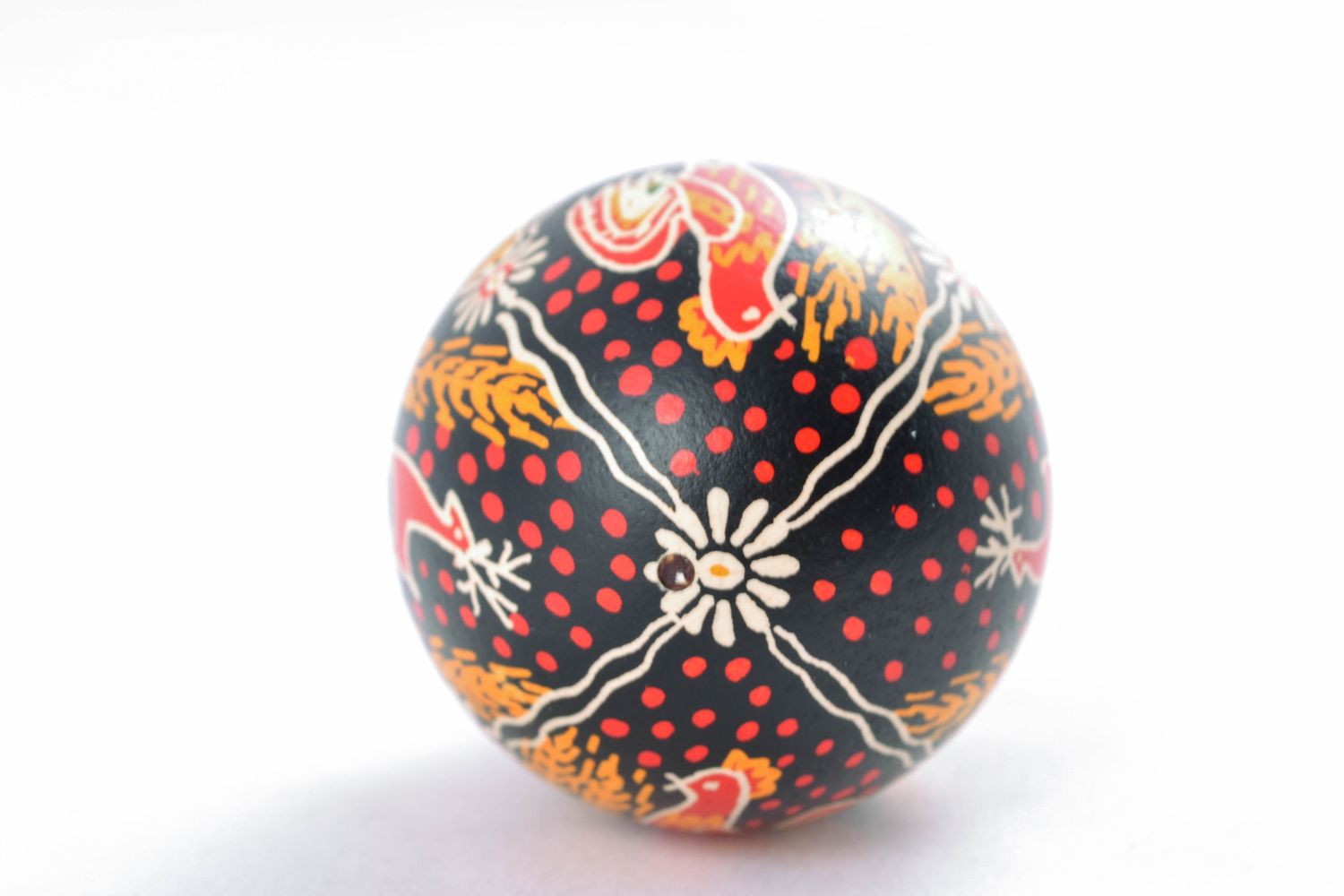 Handmade Easter egg with bright painting in Ukrainian style photo 3