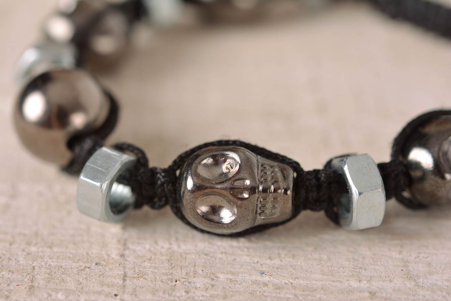 Handmade silver skull color beaded black cord bracelet with female screws photo 2