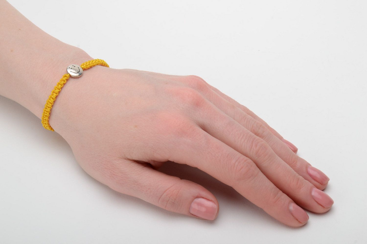 Handmade macrame woven women's wrist bracelet with metal charm smilie photo 2