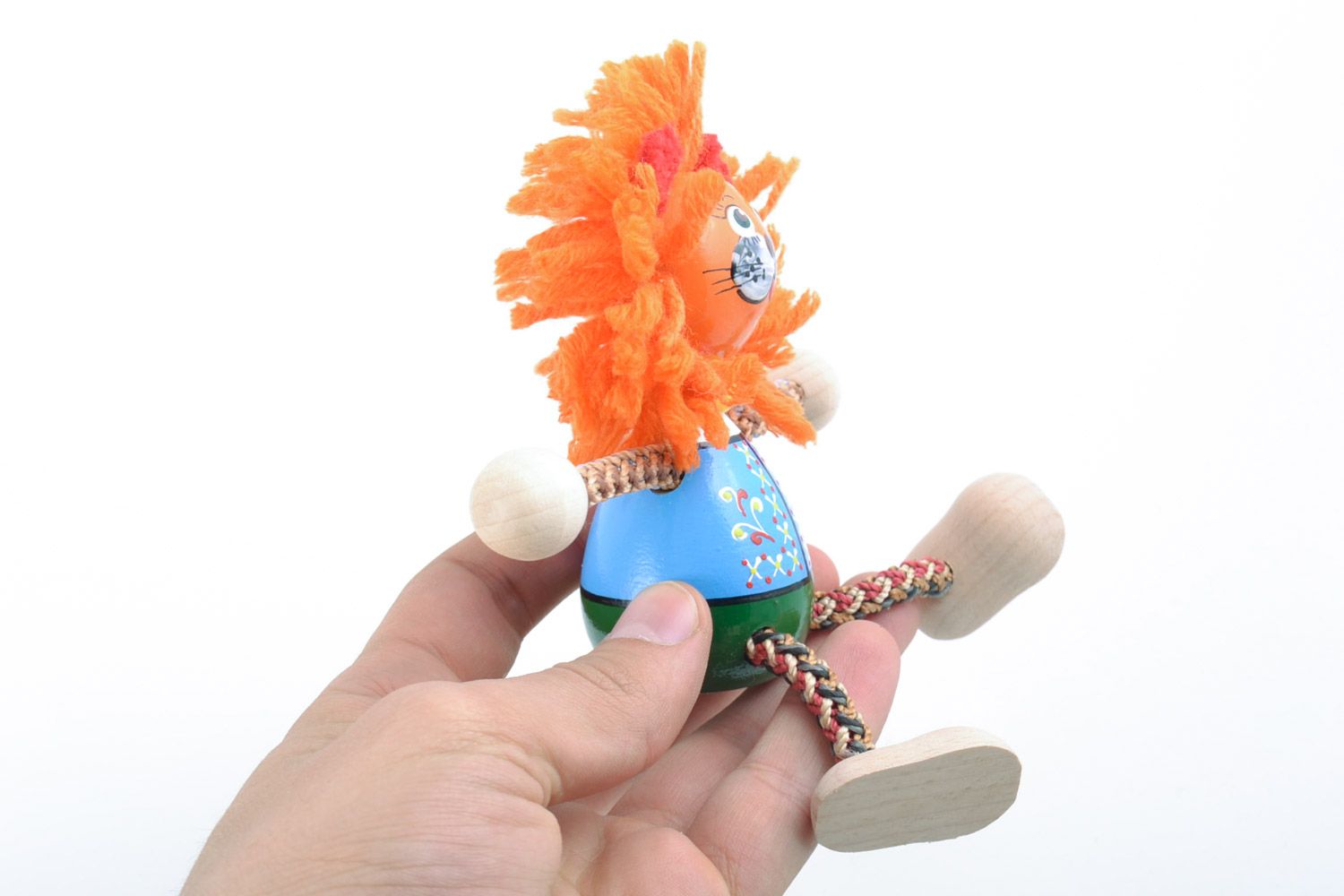 Handmade small painted eco friendly wooden toy lion with large orange mane photo 2