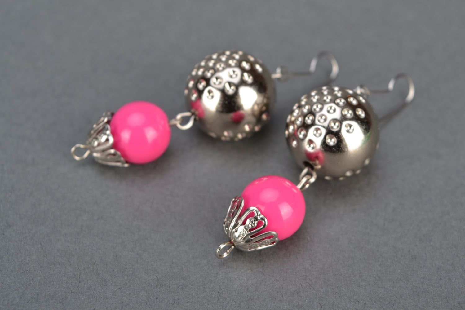 Bright pink earrings with charms photo 4