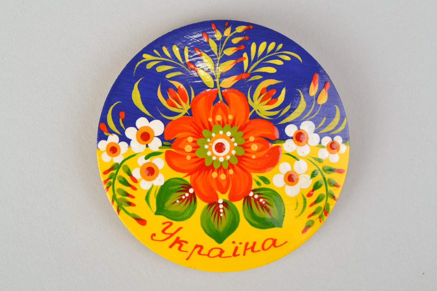 Handmade painted wooden souvenir fridge magnet of round shape in Ukrainian style photo 5