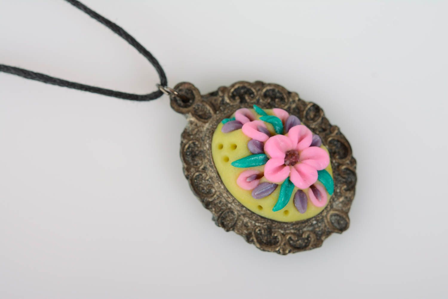 Beautiful handmade oval polymer clay flower pendant with cord photo 2