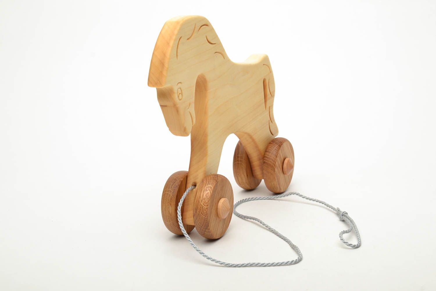 Деревянная игрушка лошадка на веревочке фото 3