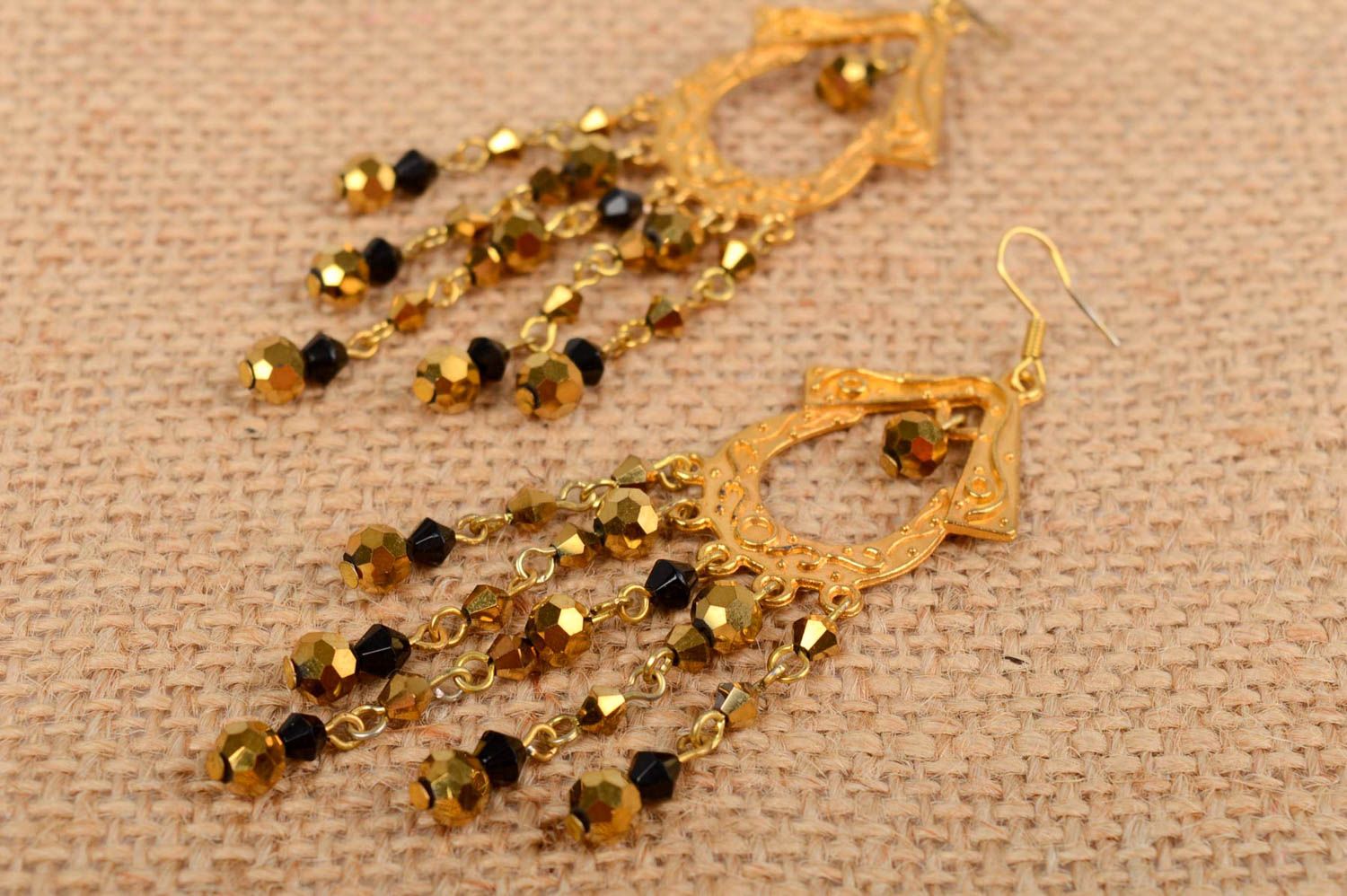 Handmade long festive dangle earrings with crystal beads in golden color palette photo 1