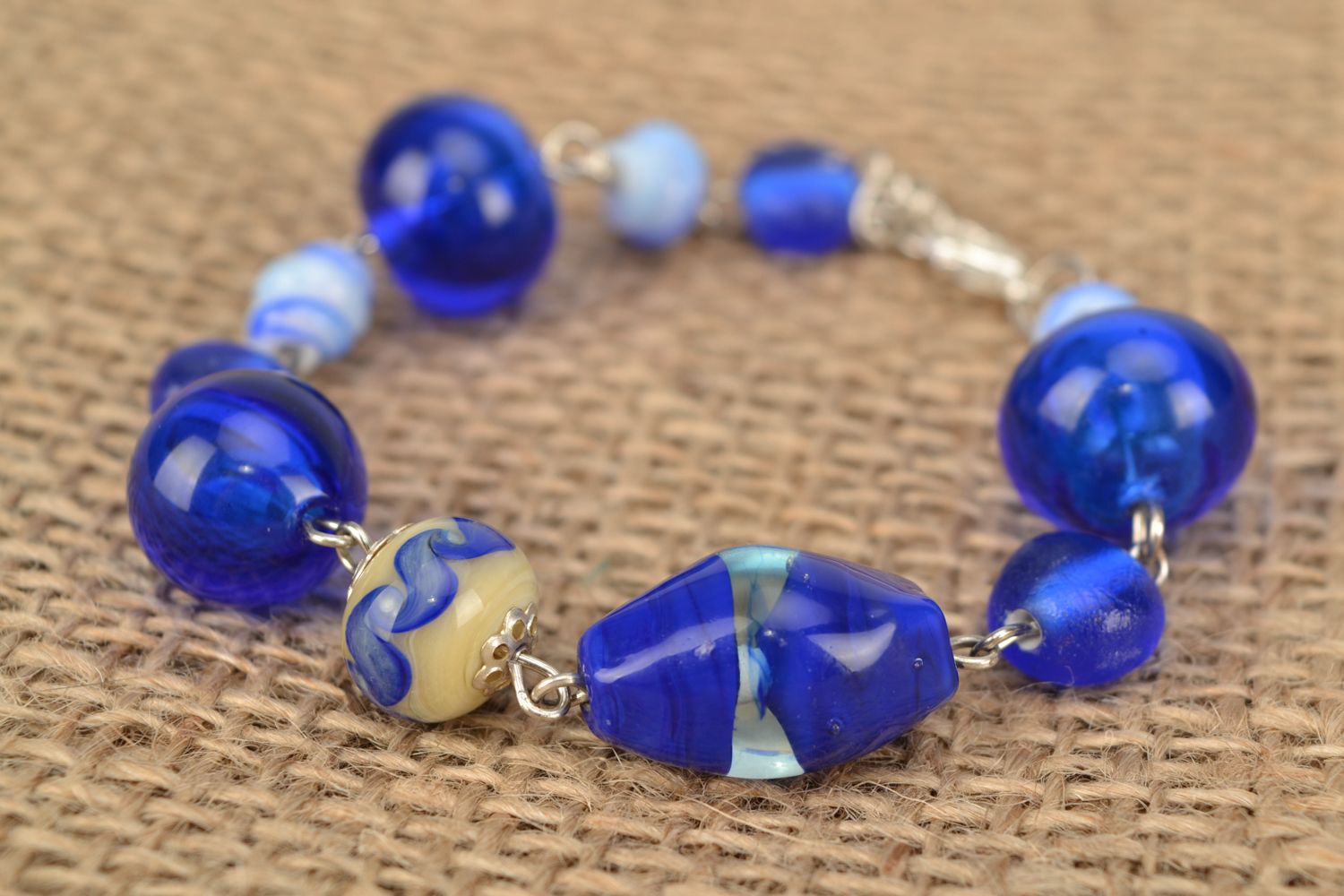 Interesting bracelet with blue lampwork glass beads photo 2