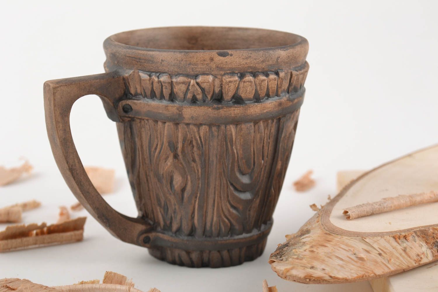8 oz clay coffee cup not glazed with fake wood pattern and triangle handle photo 1