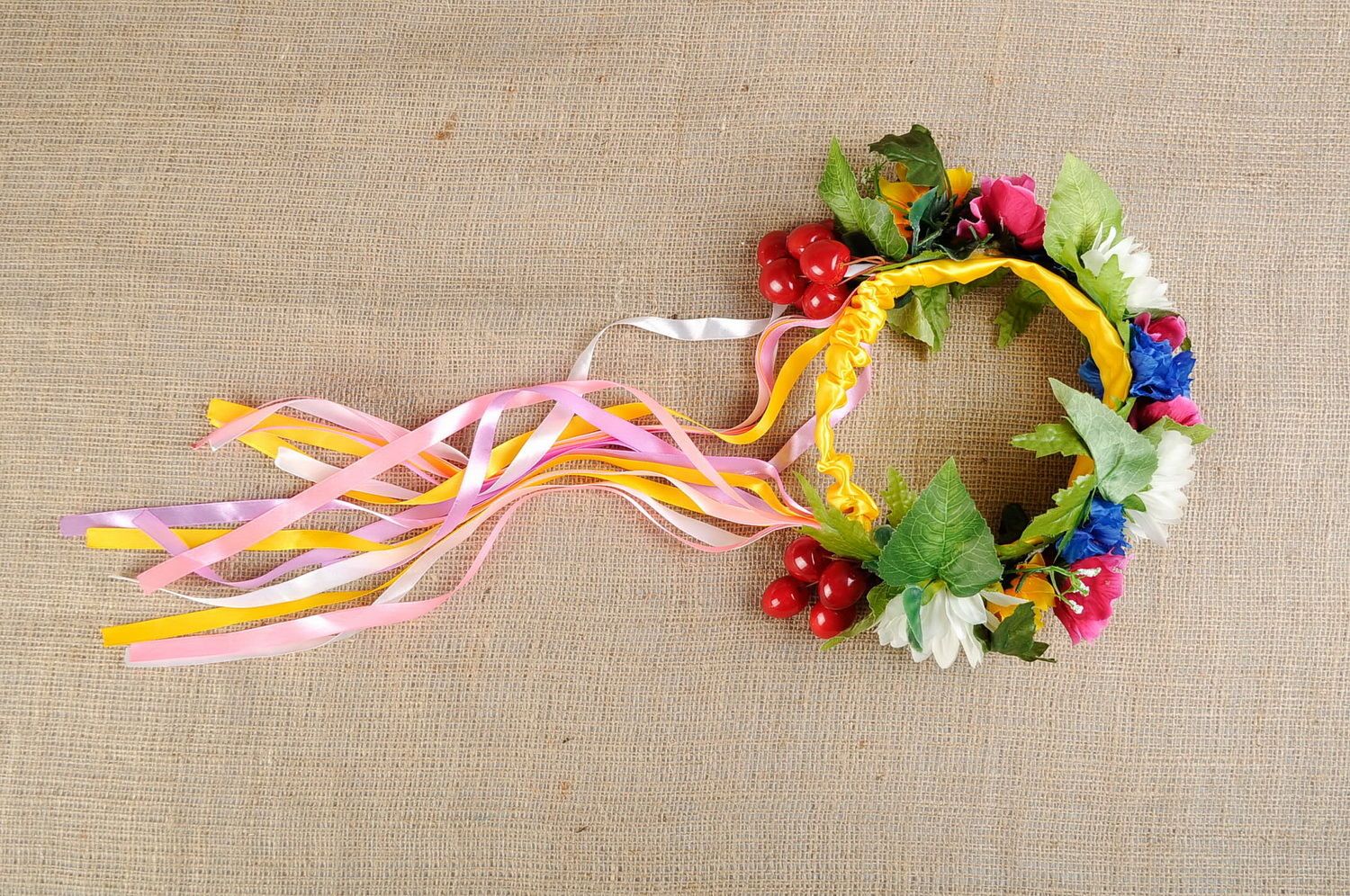 Ukrainian wreath made of artificial flowers and cherries photo 2