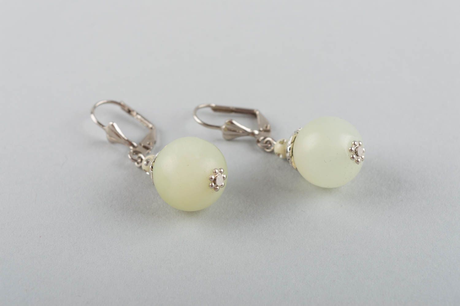 Beautiful handmade elegant brass earrings with natural nephrite stone white photo 3