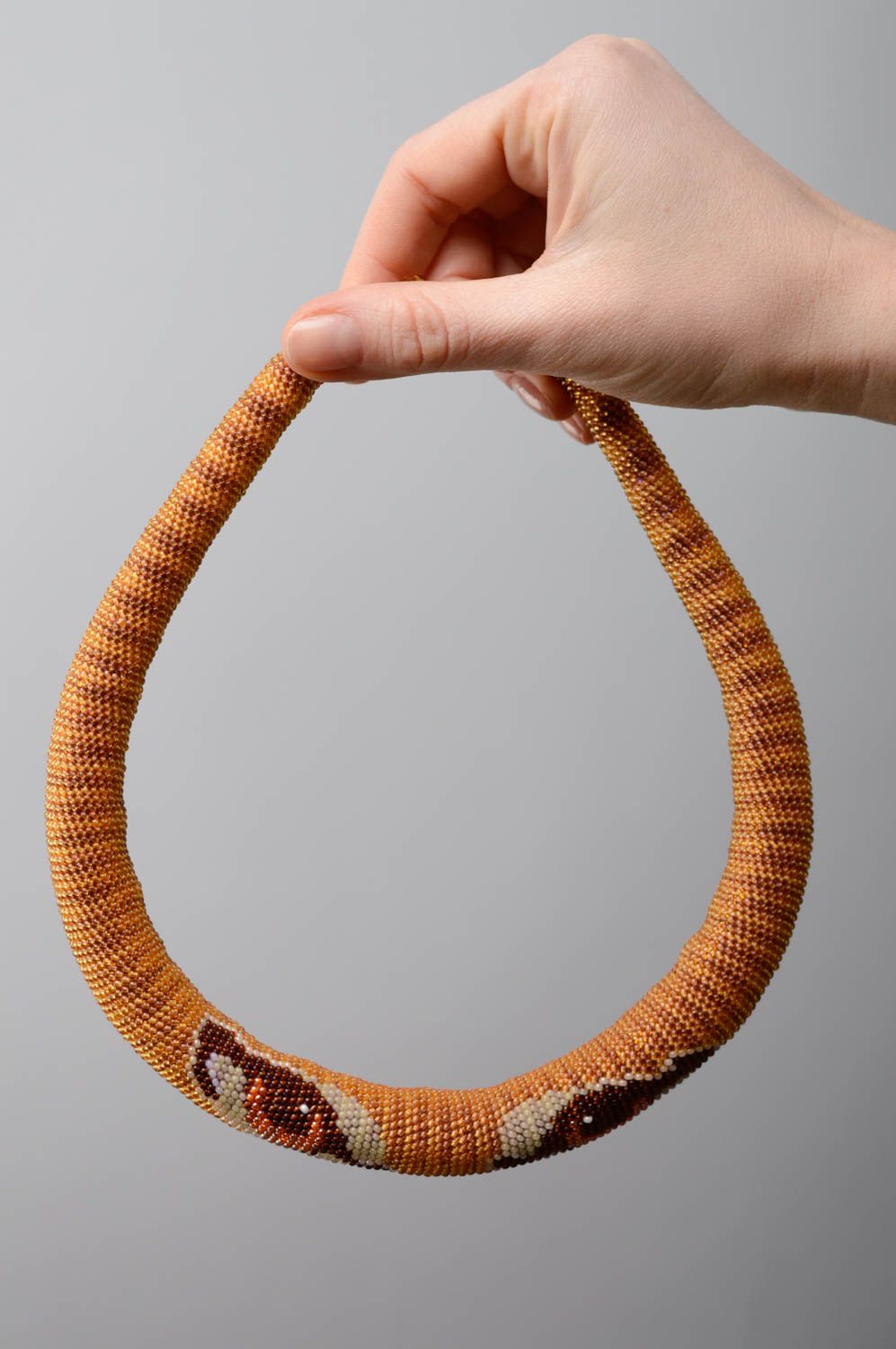 Beaded cord necklace with animal motives photo 3
