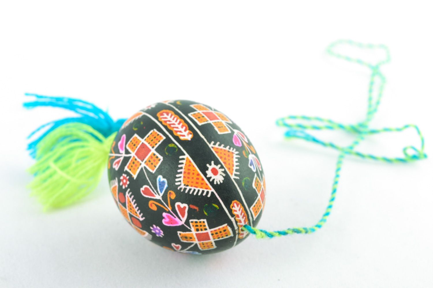 Handmade hanging Easter egg with ornament and tassels for interior decoration photo 4
