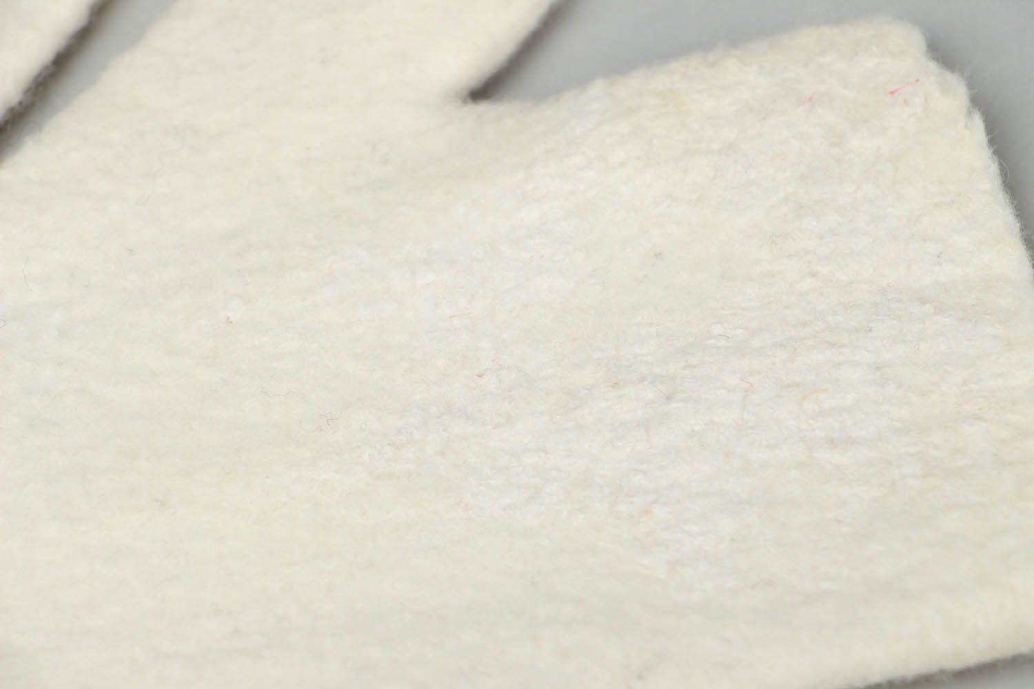 Weiße Halbhandschuhe aus Wolle foto 2