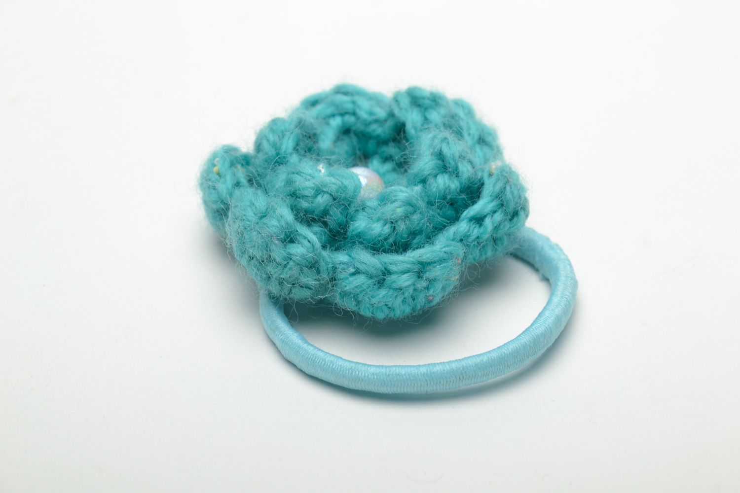 Hair tie with turquoise crochet flower photo 4
