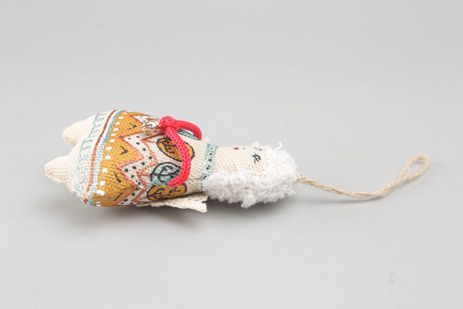 Pingente decorativo feito de tecido preenchido com trigo mourisco e processado com baunilha foto 2