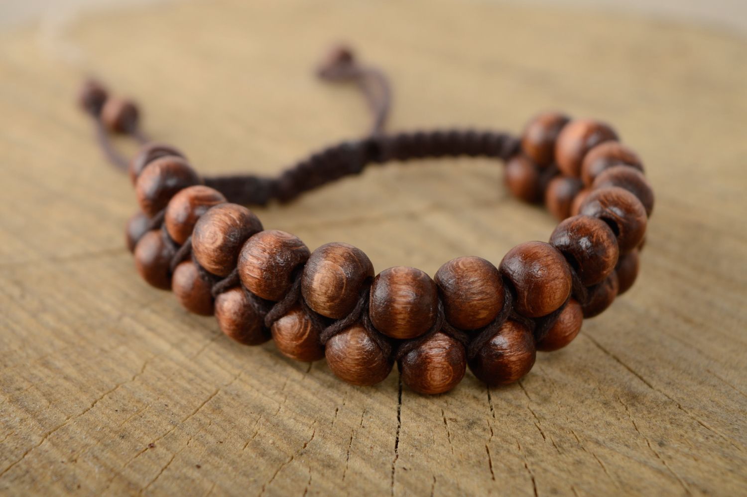 Unusual brown bracelet made of cord and beads photo 1