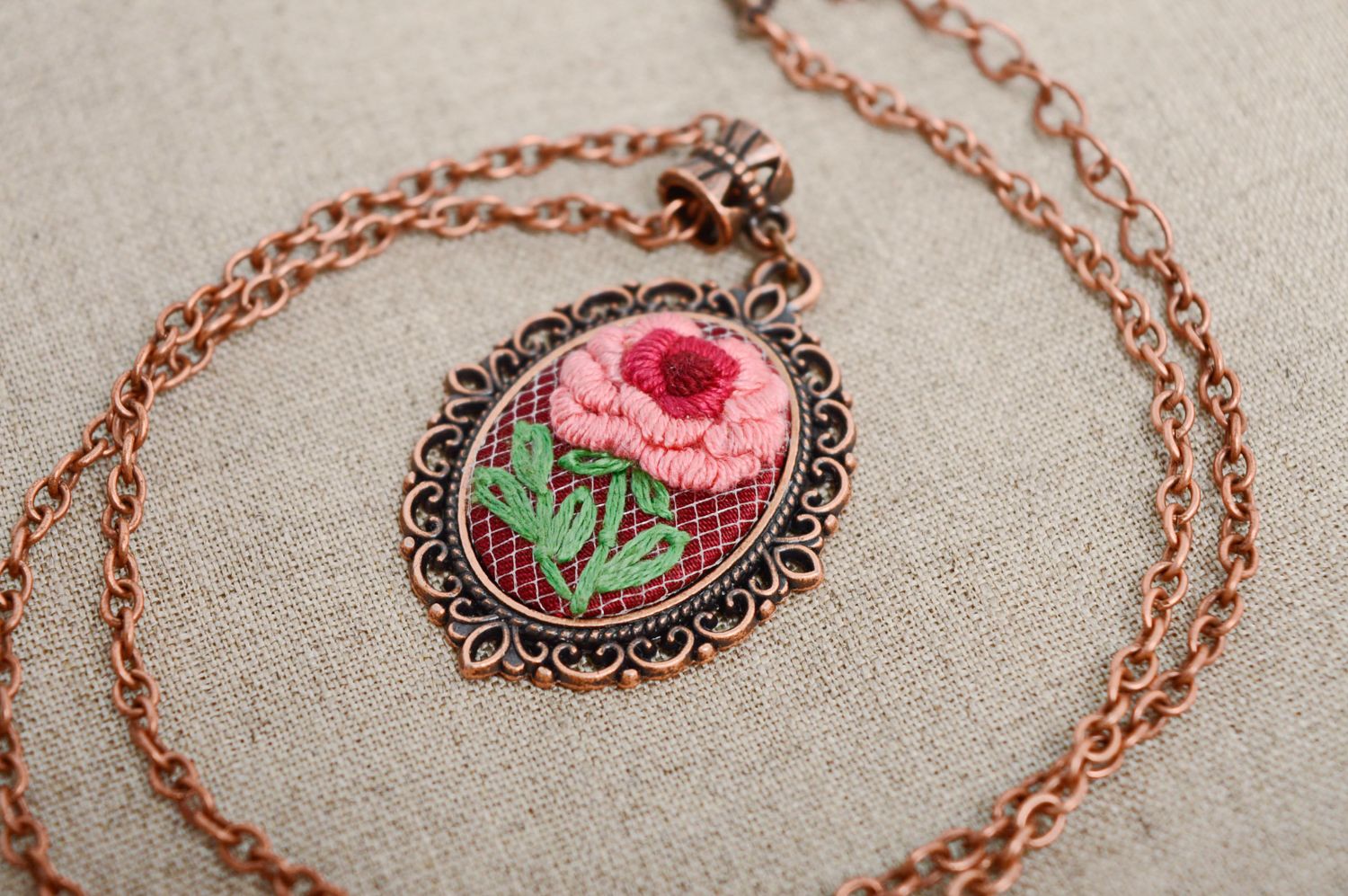 Unusual pendant with embroidery on long chain photo 1