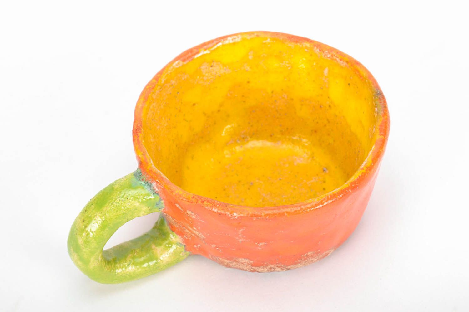 Clay hand-molded glazed drinking cup in yellow, orange, and green color photo 3