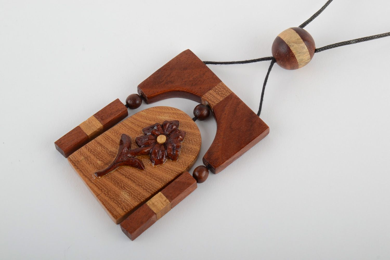 Handmade neck pendant carved of wood and decorated with volume inlay for women photo 3