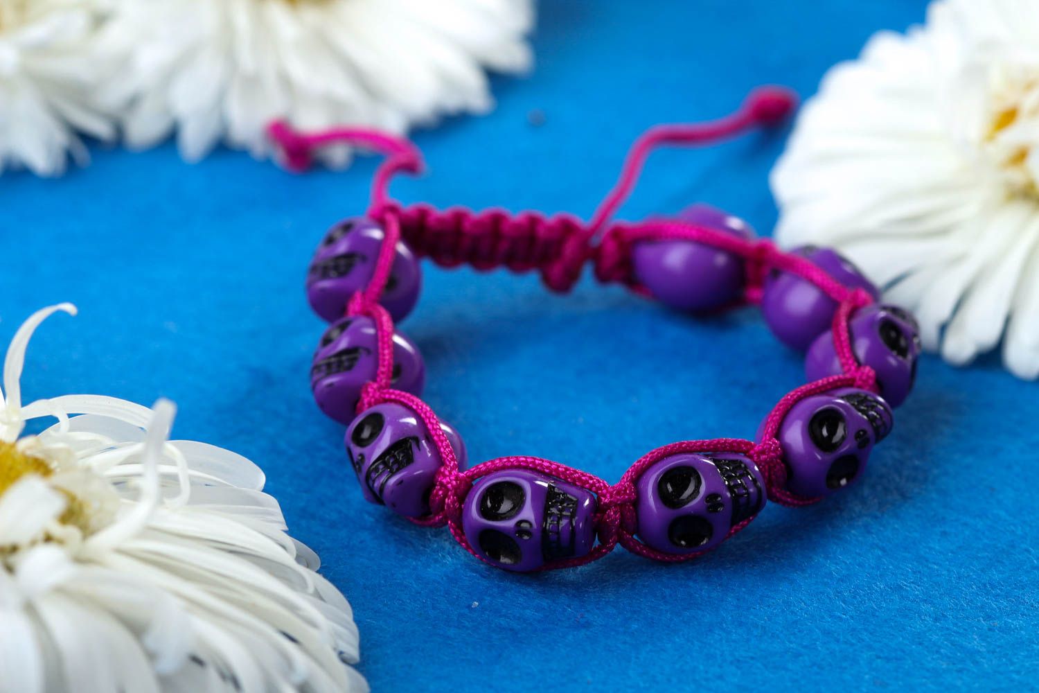 Purple strand skull beads bracelet on red cord for young girls photo 1
