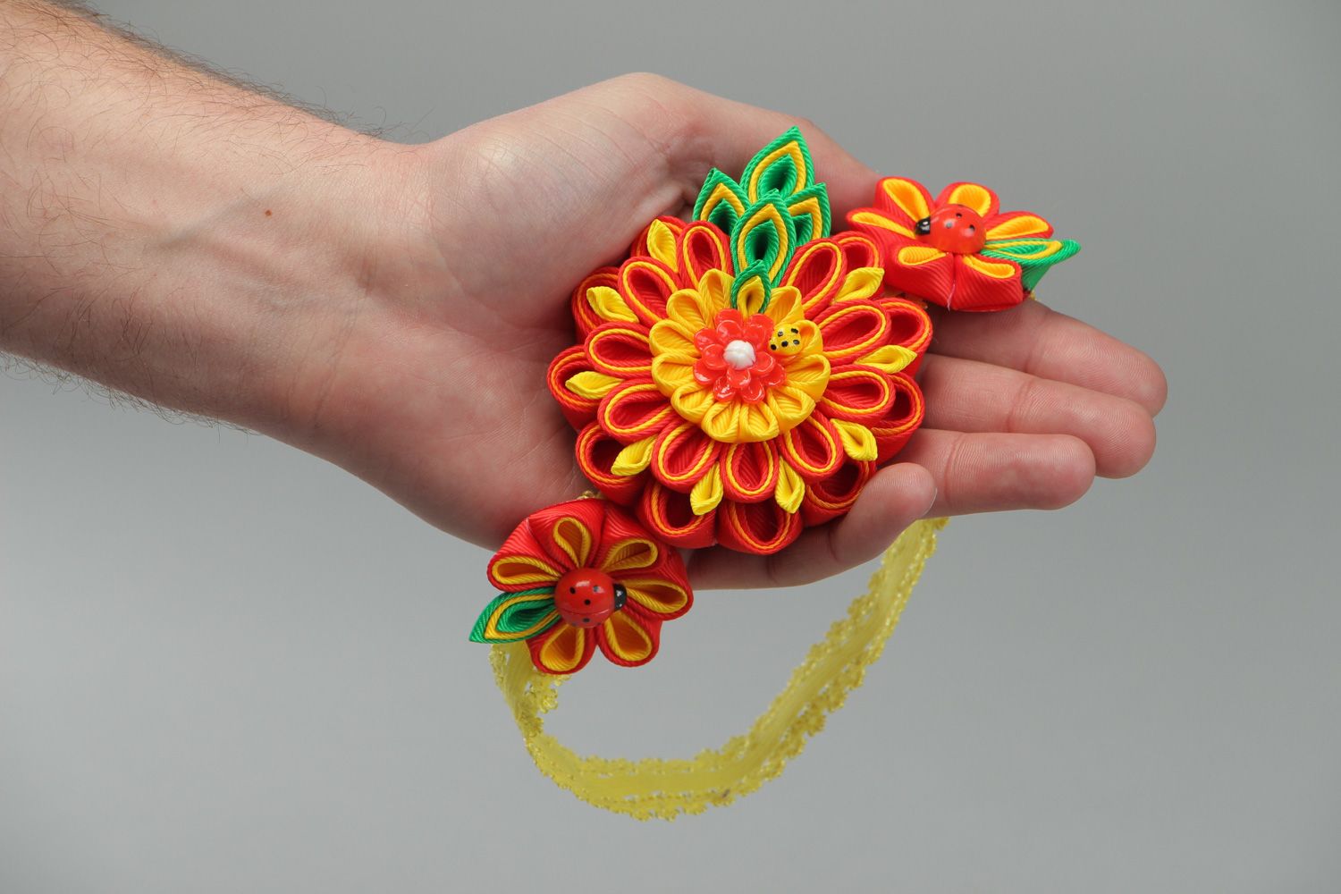 Bright handmade headband with kanzashi flowers in yellow red and green colors photo 4