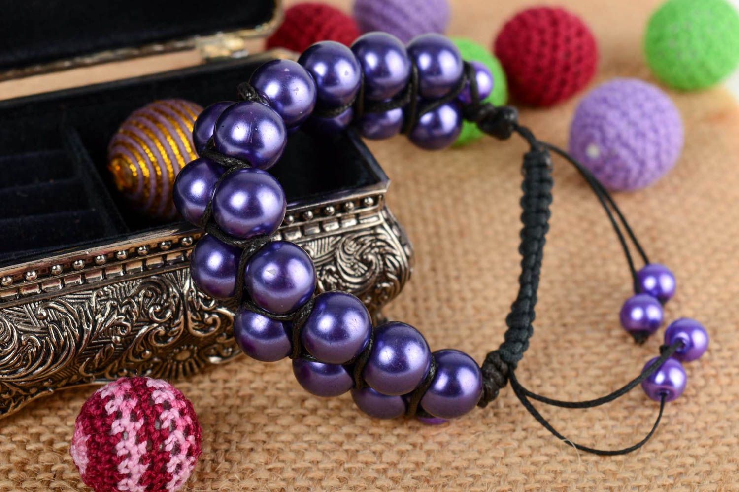 Handmade purple bracelet made of ceramic pearls and lace using macrame technique photo 1