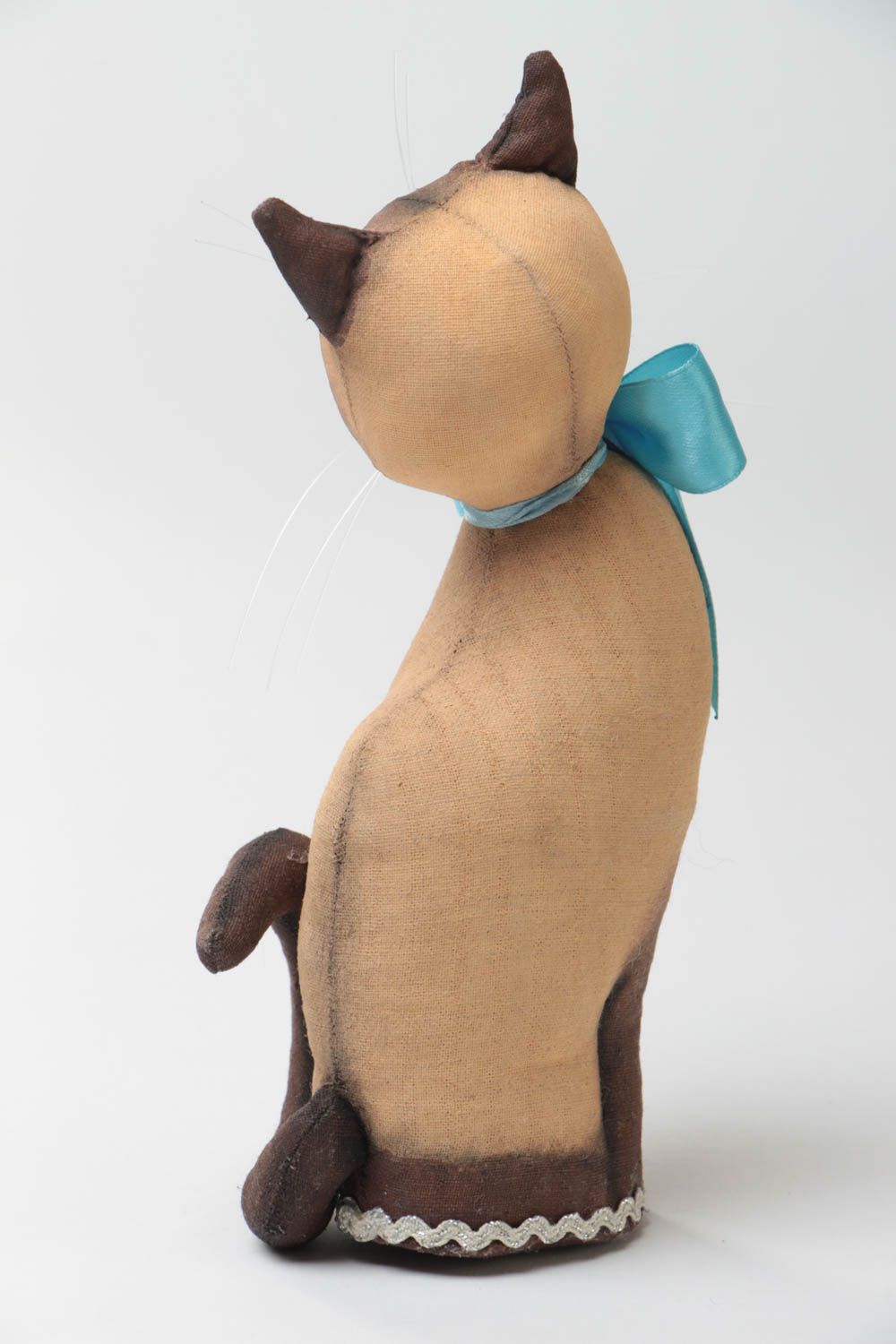 Handmade designer soft toy sewn of primed fabric beautiful cat with blue bow photo 4
