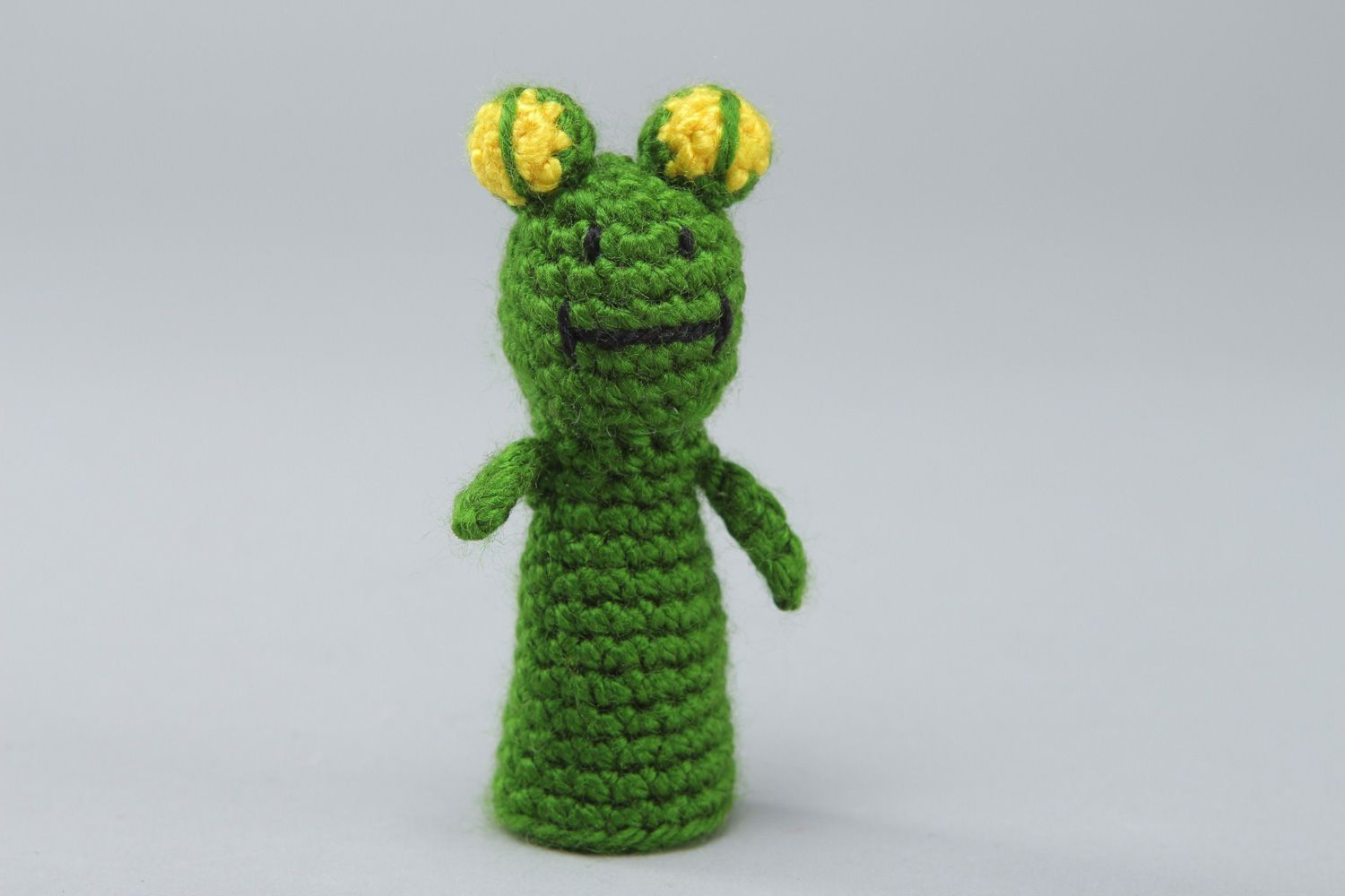 Funny handmade finger puppet crocheted of acrylic threads green frog for children photo 1