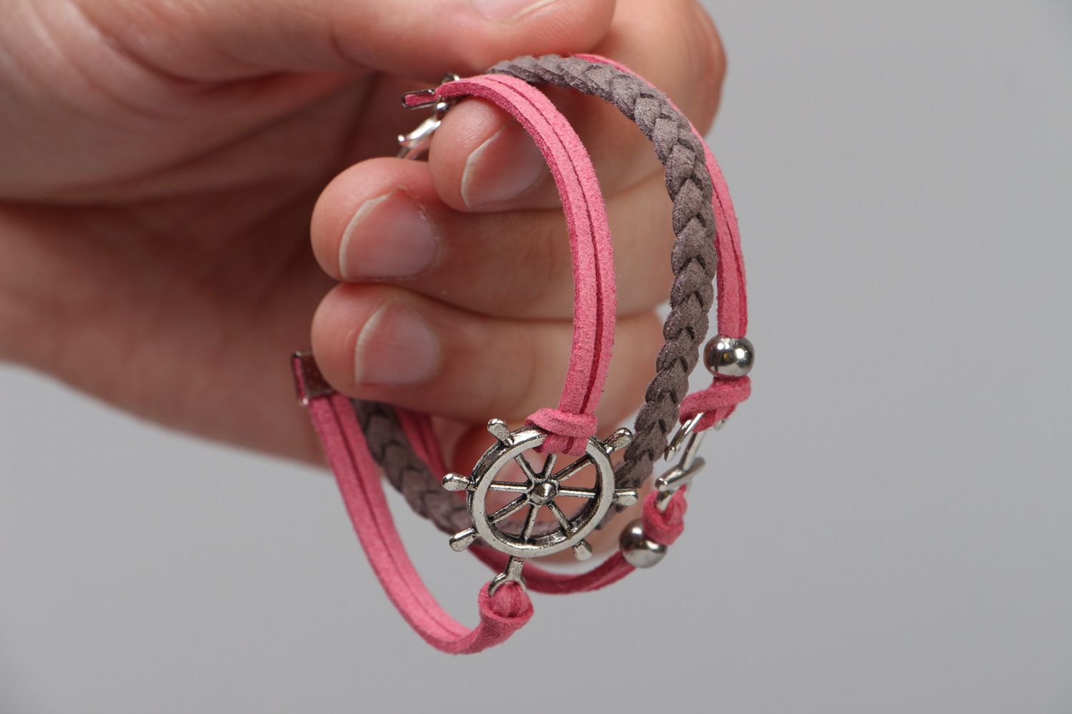 Handmade pink and gray friendship bracelet woven of faux suede with steering wheel photo 3