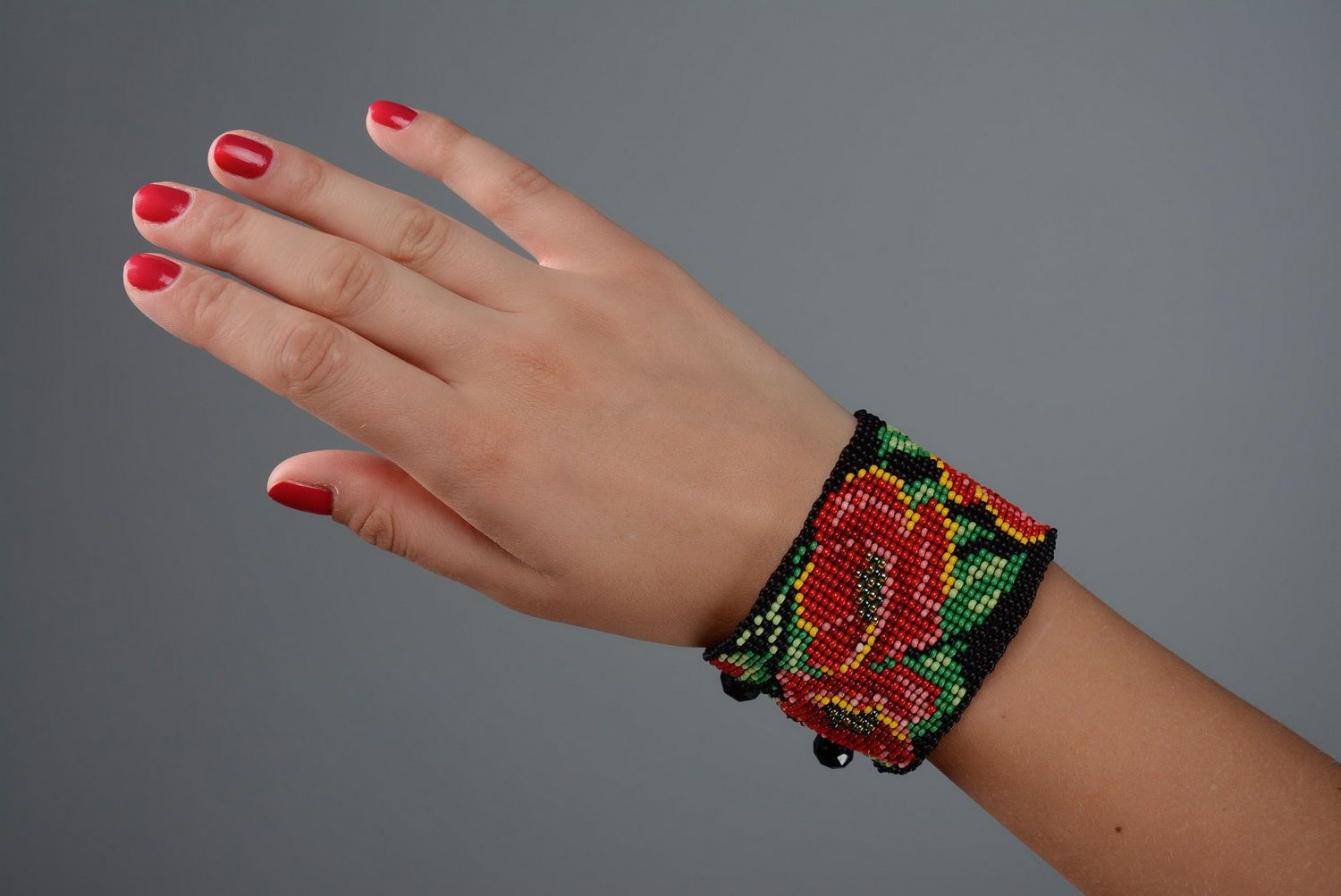 Bracelet with red flowers photo 4