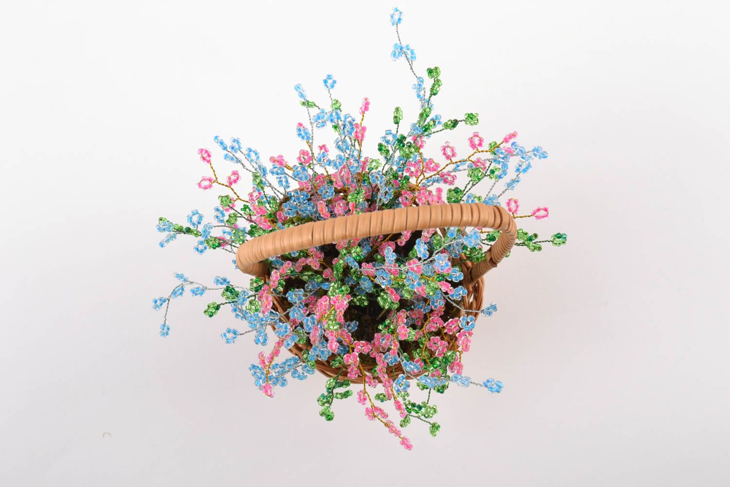 Small basket with handmade bright colorful artificial flowers woven of beads photo 2