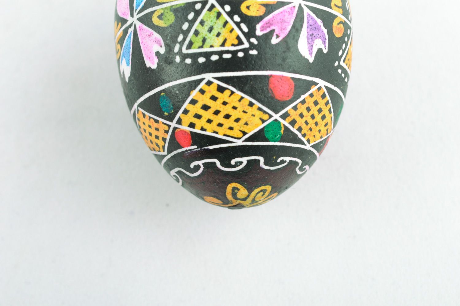 Beautiful colorful Easter egg with traditional painting made using wax technique photo 4