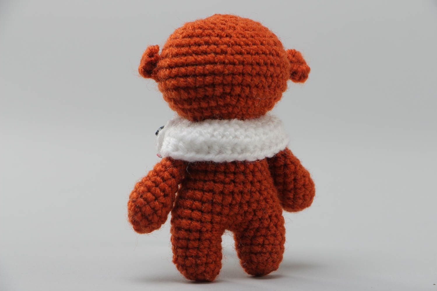 Soft handmade crocheted toy bear in brown with a small collar present for baby photo 4
