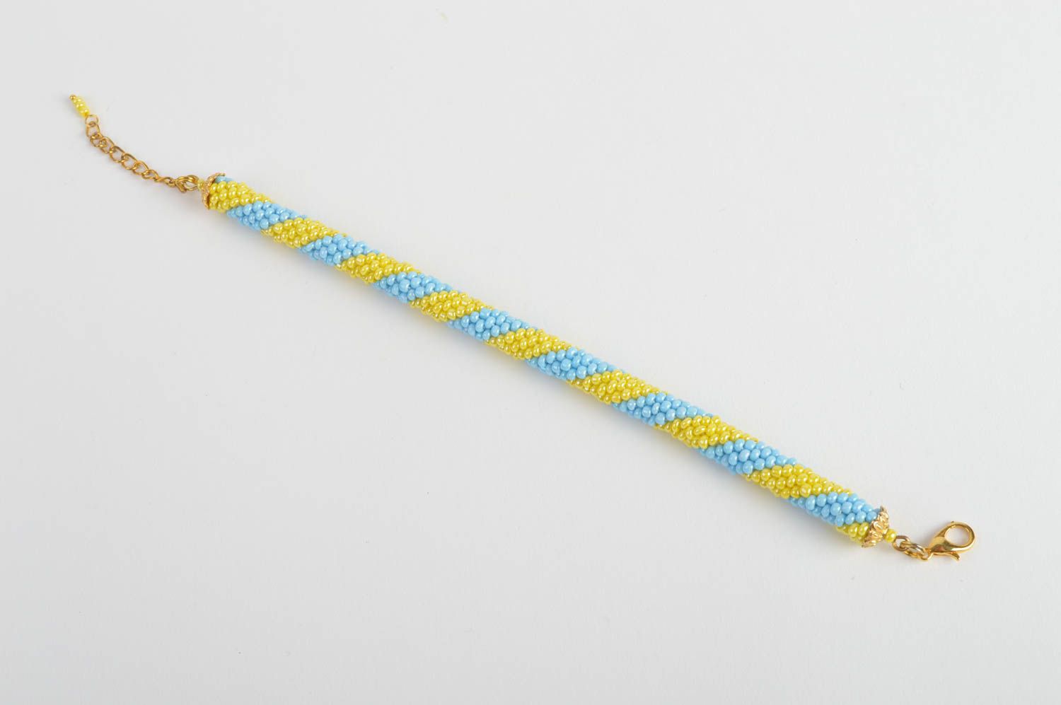 Браслет из чешского бисера в виде жгута желтый с голубым хенд мейд на цепочке фото 5