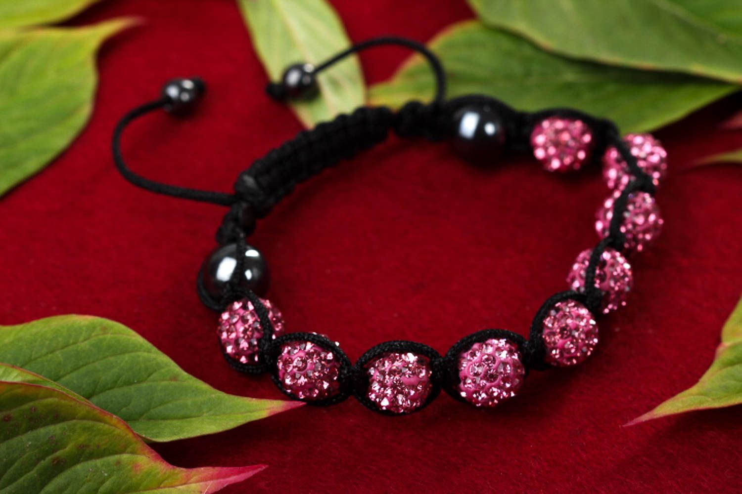 Strand pink and black beads bracelet on the black cord for women photo 1