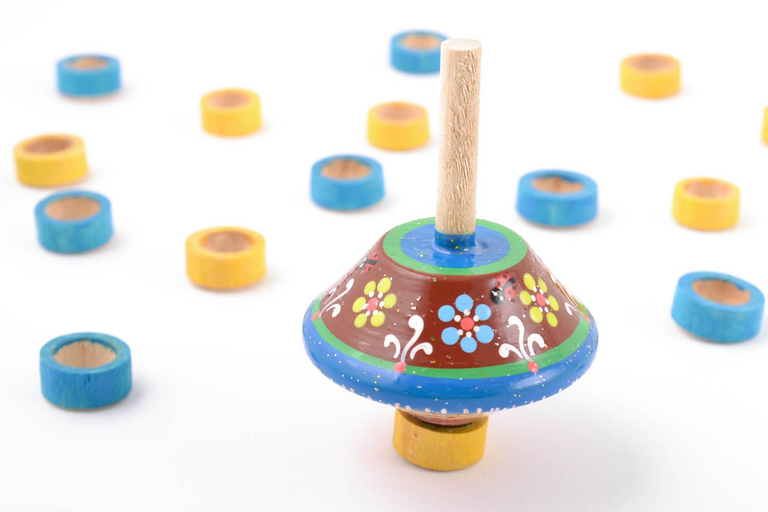 Lustiger handgemachter bunter kleiner Brummkreisel aus Holz Öko Spielzeug  foto 1