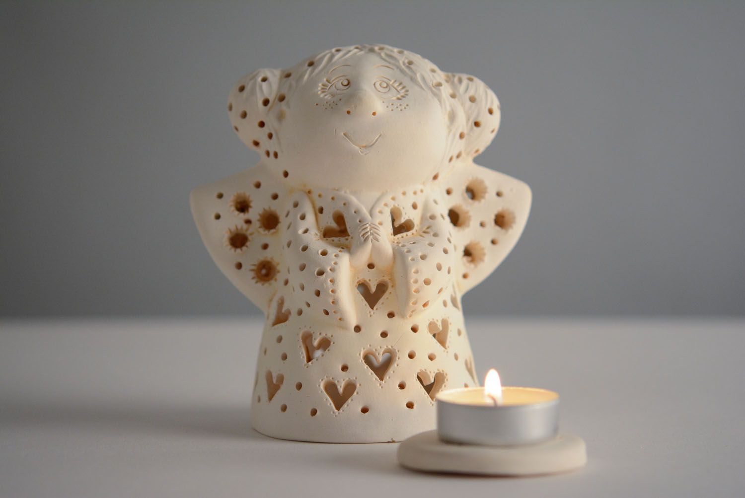 Ceramic candle holder in the shape of angel photo 3